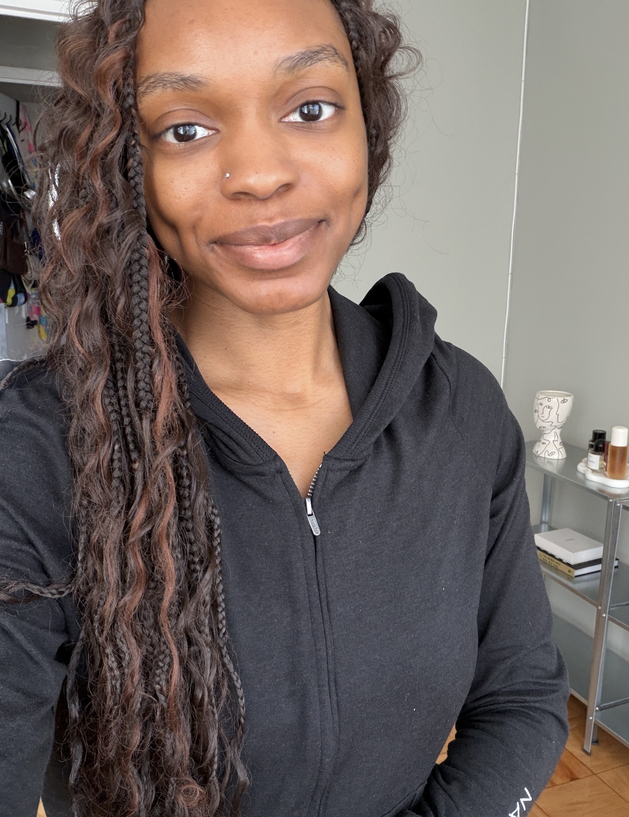 a before image of a woman testing foundation