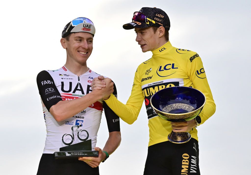 Duel for the history books, Jonas Vingegaard (Jumbo-Visma) with overall leader&rsquo;s yellow jersey shakes hands with Tadej Pogačar (UAE Team Emirates) in best young rider&rsquo;s jersey