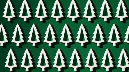 green background white Christmas tree shapes