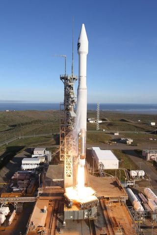 A United Launch Alliance Atlas 5 rocket carrying the Air Force's DMSP-19 military weather satellite lifts off from Space Launch Complex-3 at Vandenberg Air Force Base, Calif., on April 3, 2014.