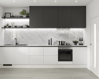 A modern black and white kitchen with dark kitchen cabinetry and marble backsplash