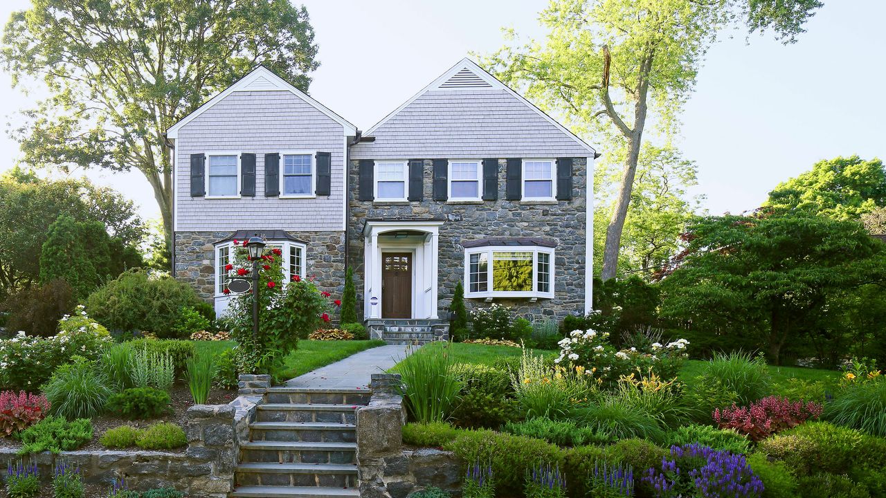 Front yard landscaped with colorful planting