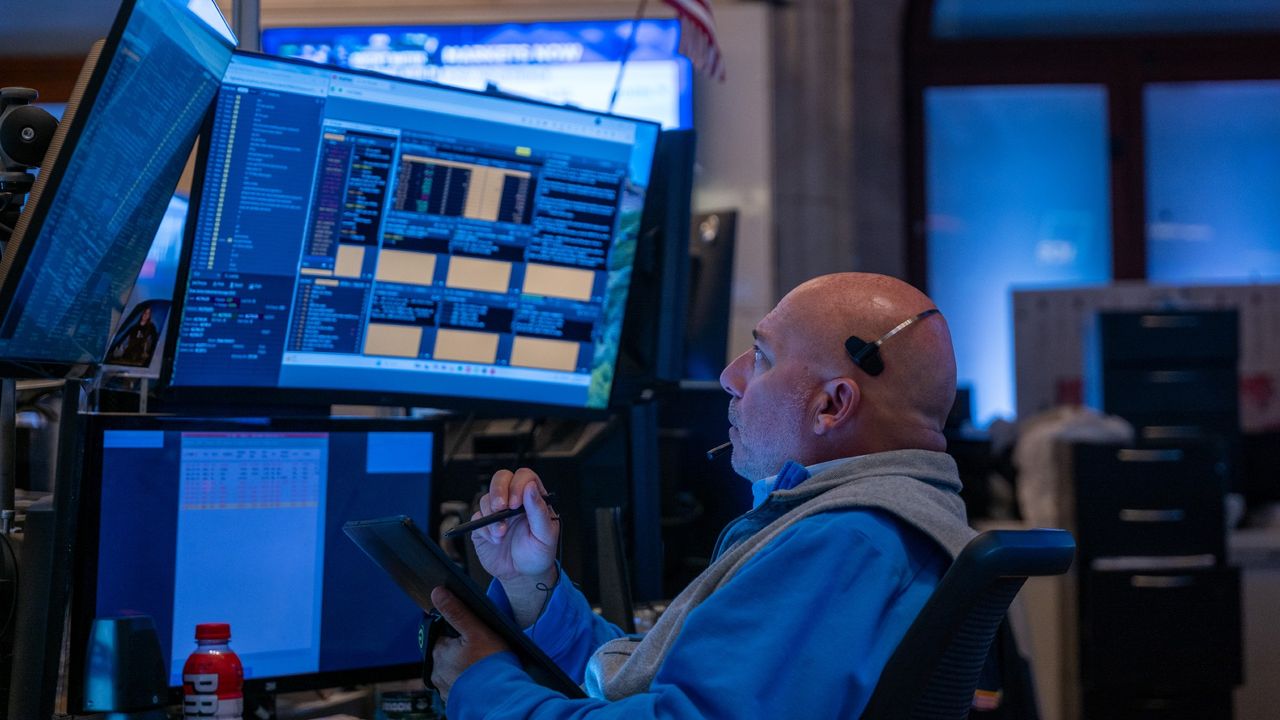 A trader on the New York Stock Exchange floor