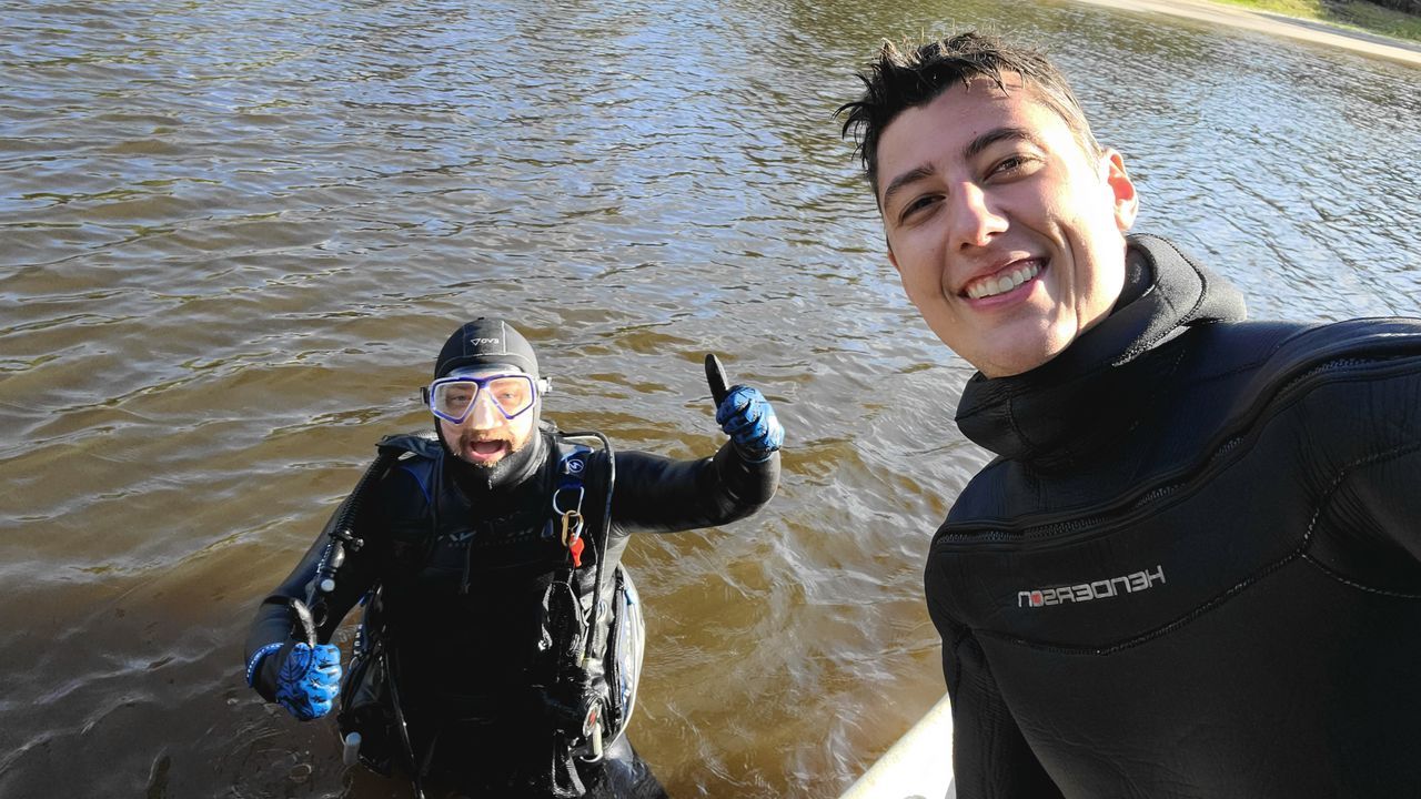 Derek Demeter and Henry Sadler discovered the enormous bone from an Ice Age mammoth while diving in Peace River in Florida.