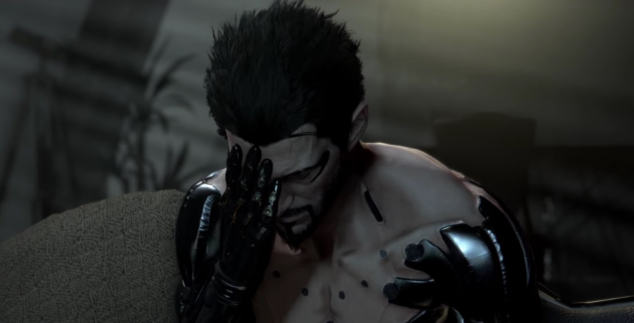 Adam Jensen holding his face in his hand