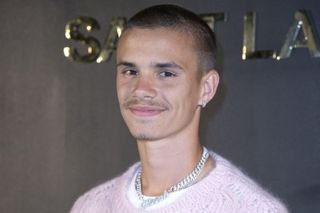 Romeo Beckham attending the Saint-Laurent Womenswear Fall/Winter 2022/2023 show as part of Paris Fashion Week