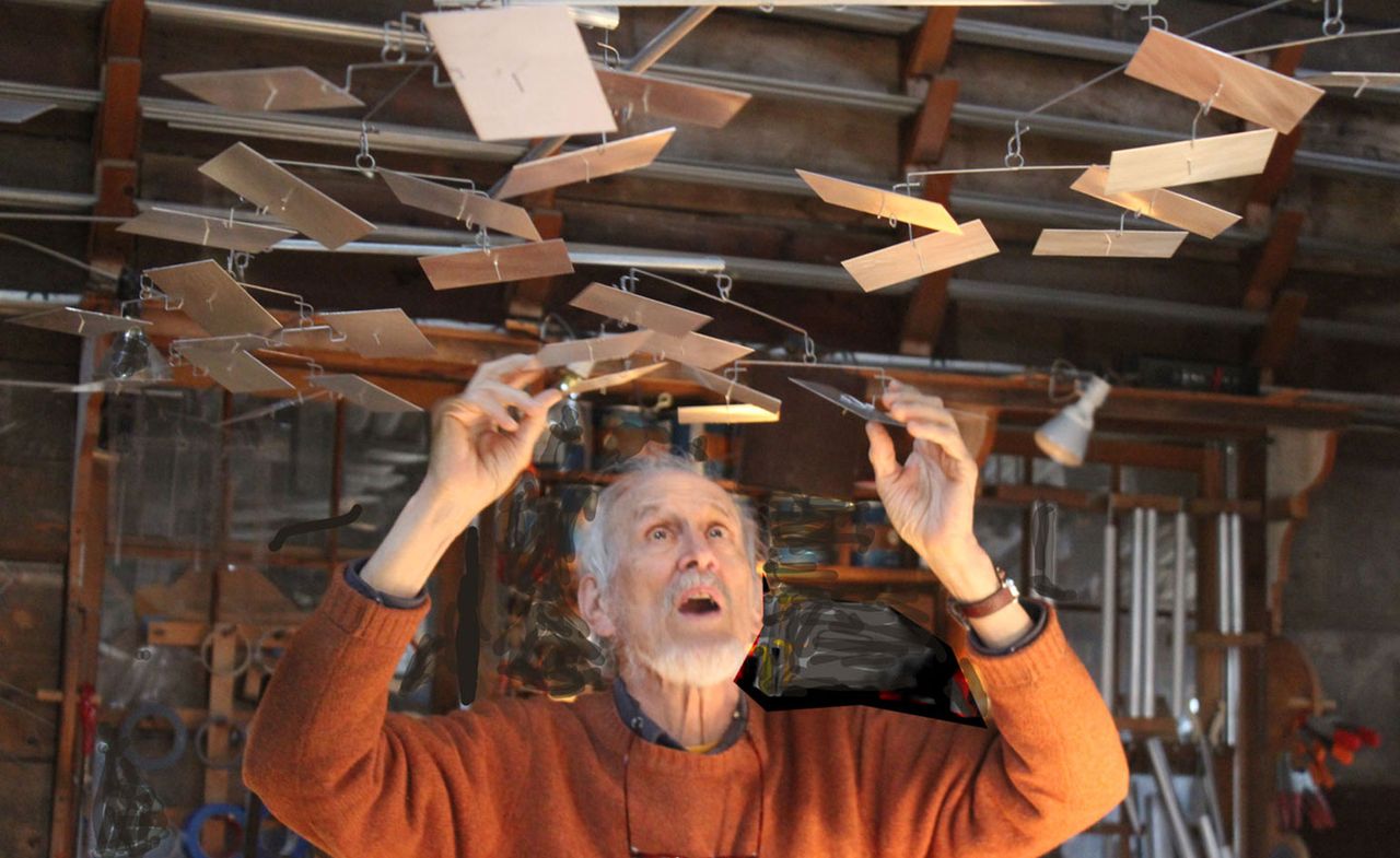 Portrait of American kinetic artist Tim Prentice with sculpture in progress