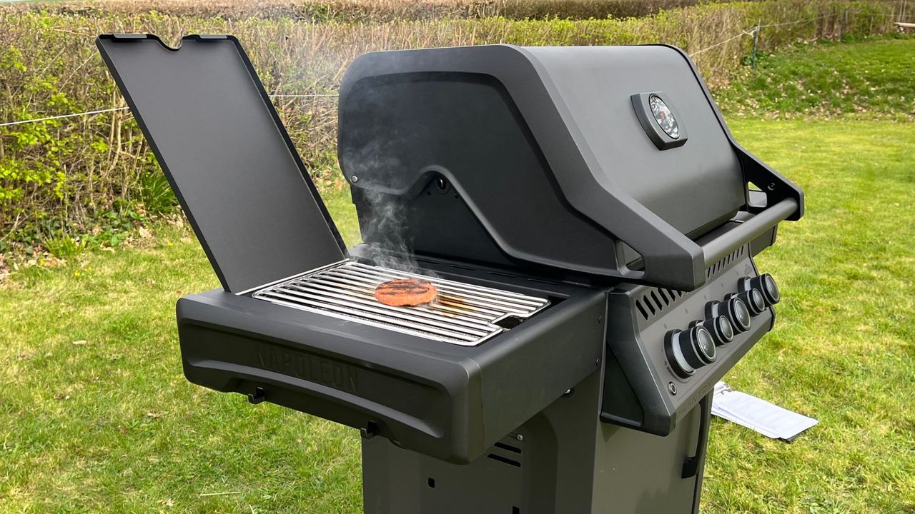 Testing a burger on the The side burner on the Napoleon Phantom Rogue