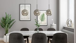 Modern Dining Room With Marble Dining Table, Pendant lights, Plants And Posters