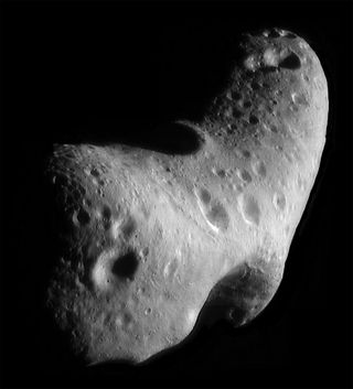 This image, taken by NASA's Near Earth Asteroid Rendezvous mission in 2000, shows a close-up view of Eros, an asteroid with an orbit that takes it somewhat close to Earth. NASA's Spitzer Space Telescope observed Eros and dozens of other near-Earth asteroids as part of an ongoing survey to study their sizes and compositions using infrared light.