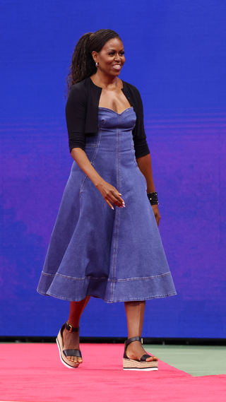ormer First Lady of the United States Michelle Obama attends Opening Night celebrating '50 years of equal pay' during Day One of the 2023 US Open at Arthur Ashe Stadium at the USTA Billie Jean King National Tennis Center on August 28, 2023 in the Flushing neighborhood of the Queens borough of New York City
