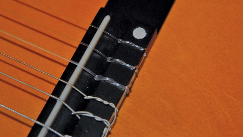 Guitar setup how to restring a nylonstring classical guitar MusicRadar