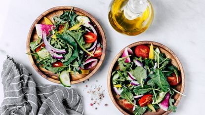 Healthy salad dressings: Two salad bowls