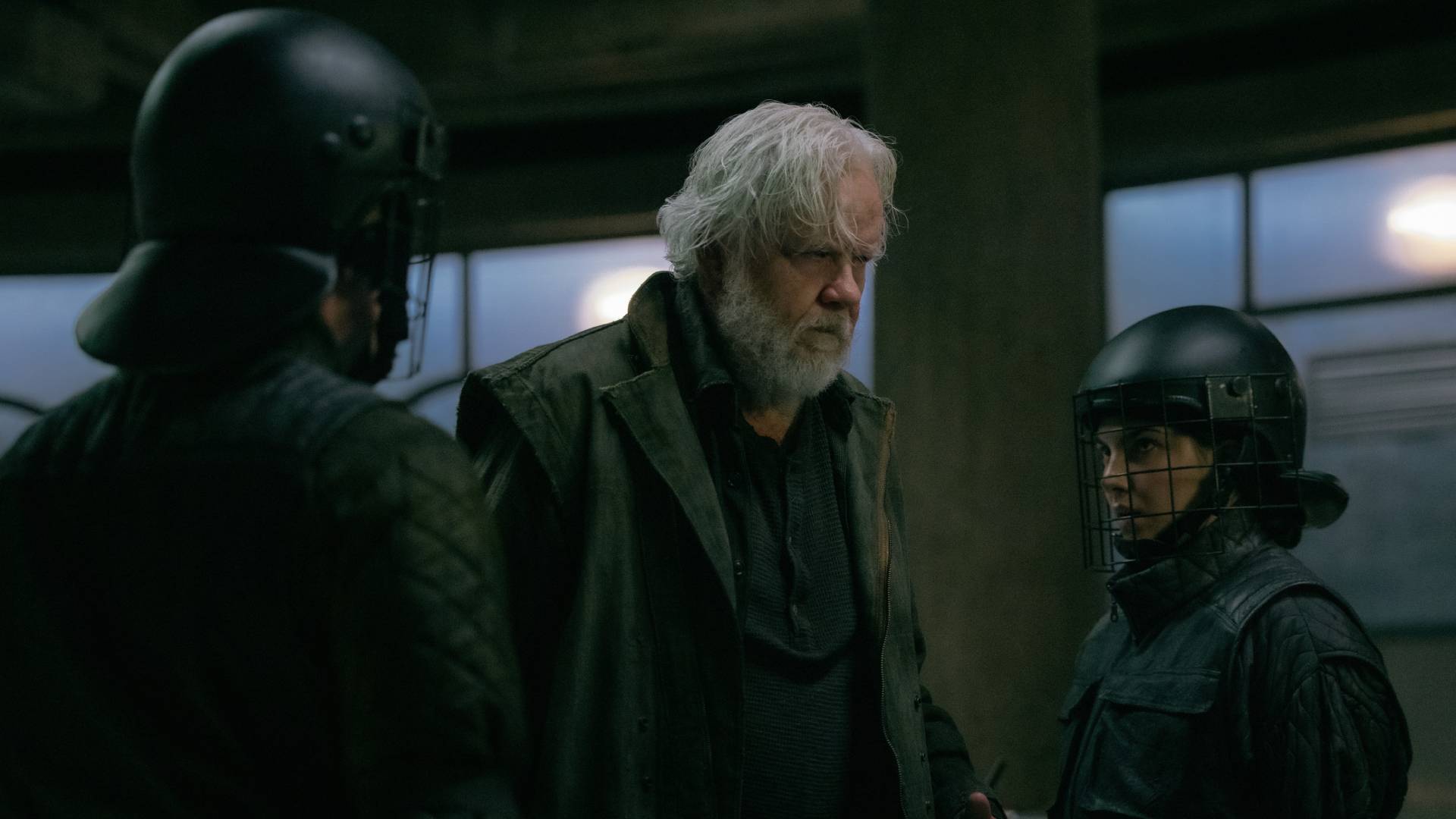 Bernard (Tim Robbins) being led out to clean in Silo season 3 episode 9