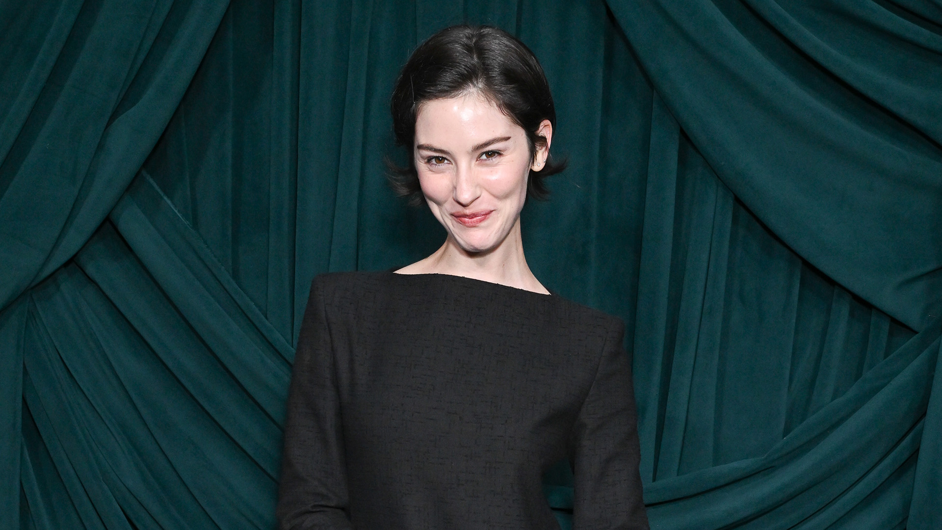 Gracie Abrams in green shoes.