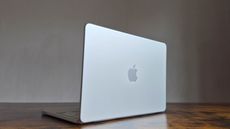 The MacBook Neo in silver on a desk.