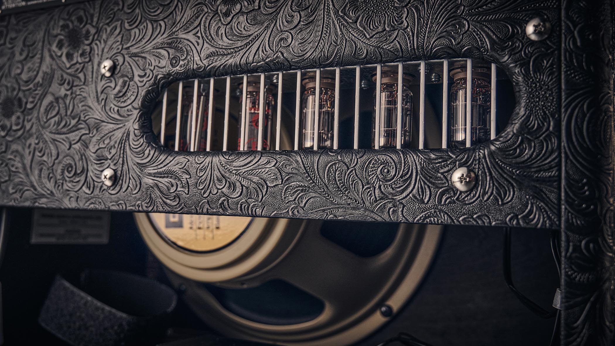 Fender Blues Junior IV 30th Anniversary: the classic combo is refinished with a touch of cowboy western flair, and is here photographed against some weathered floorboards in close-up