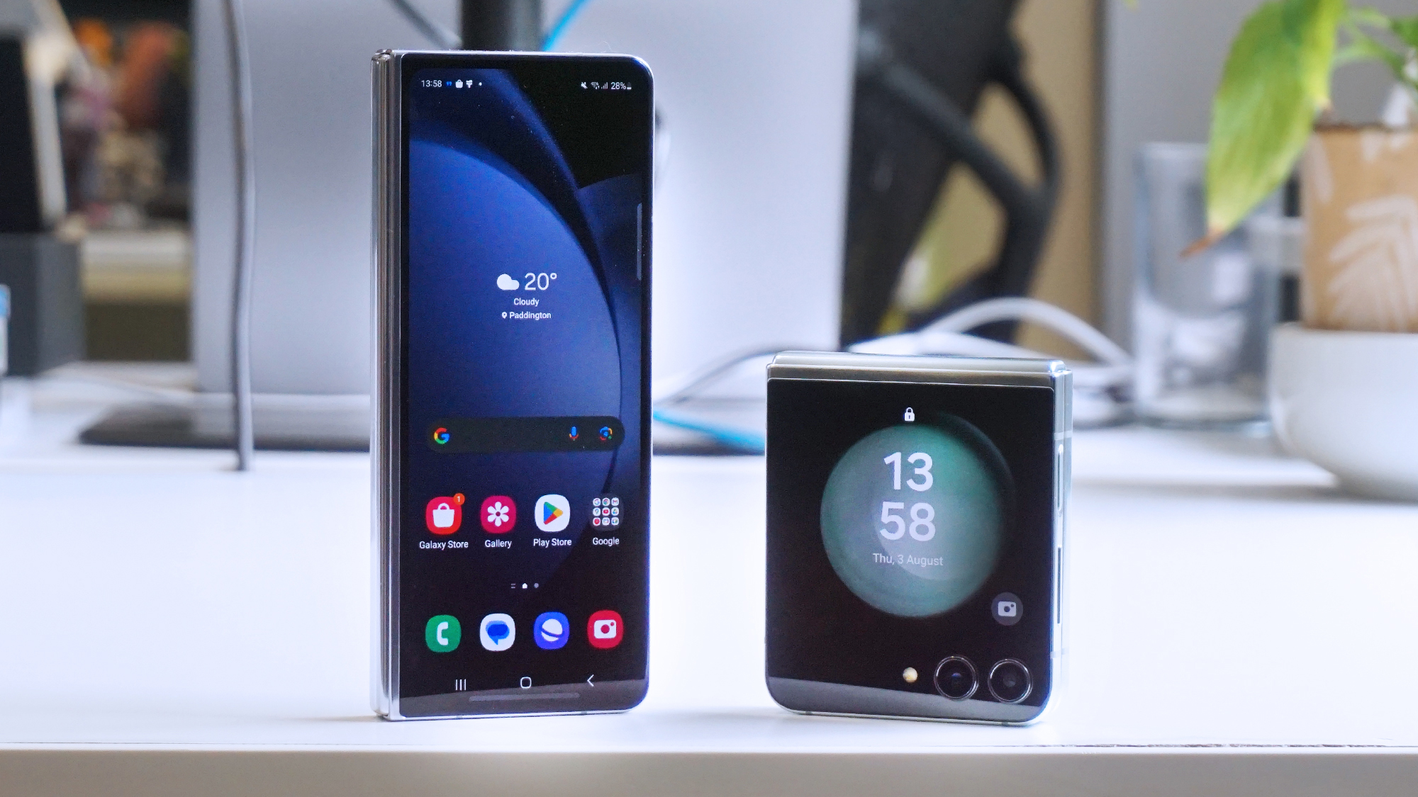 The Samsung Galaxy Z Fold 5 and Galaxy Z Flip 5 on a table while folded