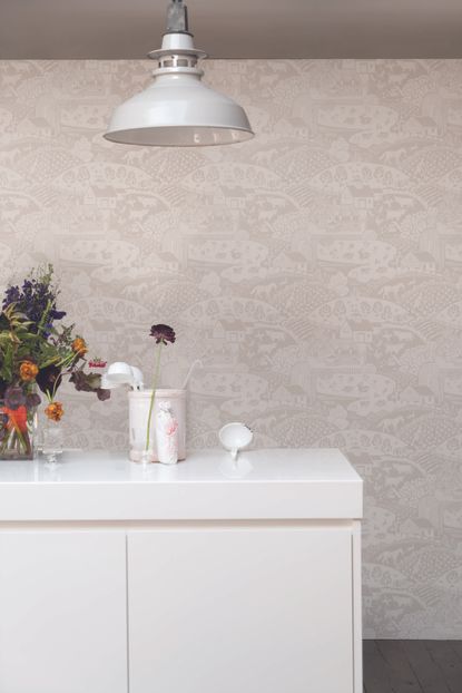Off white embossed wallpaper in modern kitchen with island