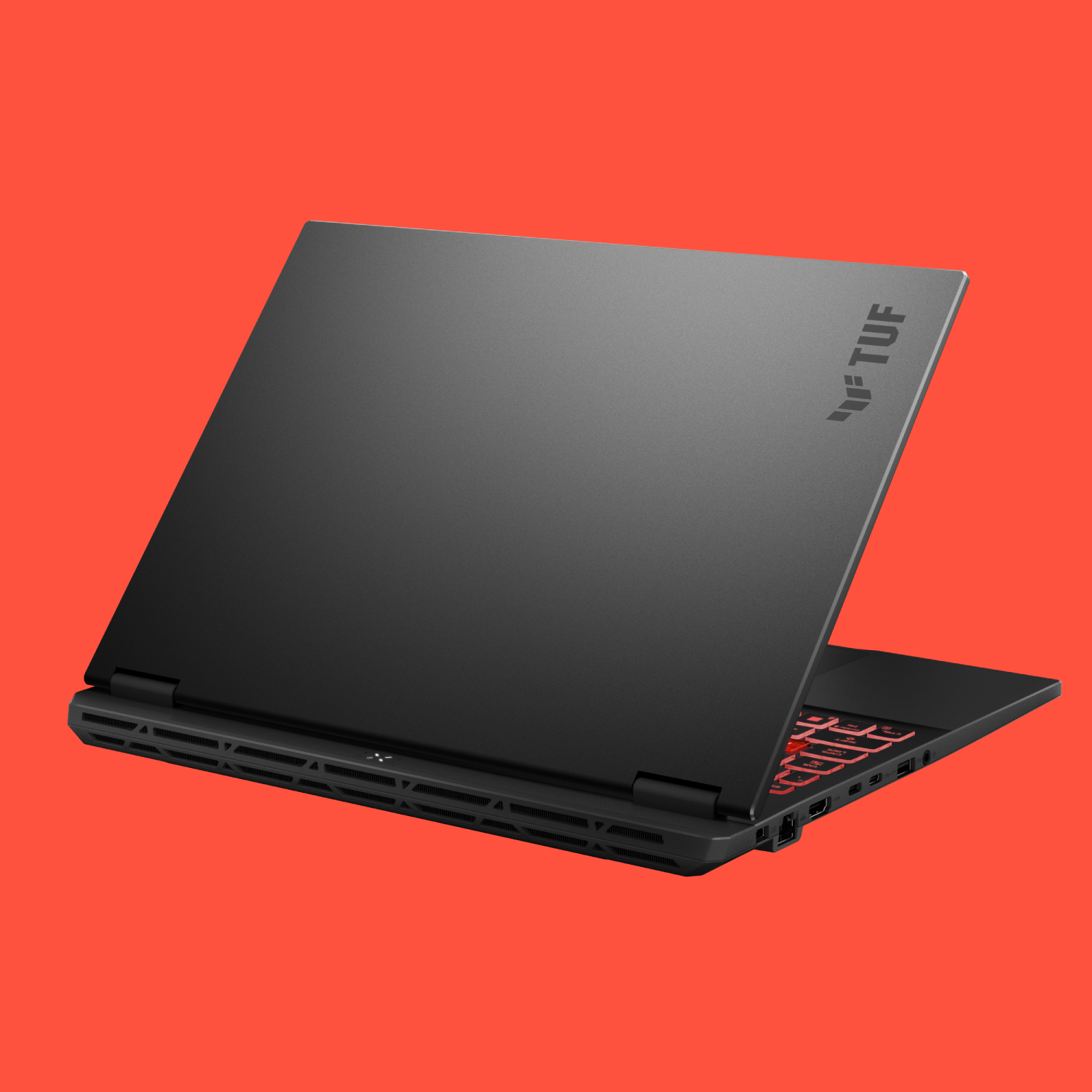 The Asus TUF A14 (2025) on a red background