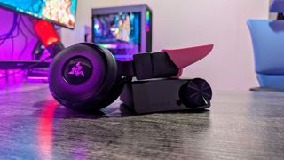 The Razer Kraken V4 Pro propped up on its OLED Control Hub.