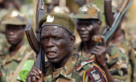 Soldiers of South Sudan&amp;#039;s SPLA army: The two Sudans are close to igniting a civil war and it may be time for the U.S. or China to step in as peacemaker. 