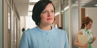 Elisabeth Moss as her iconic role as Peggy Olson in the TV show, Mad Men.