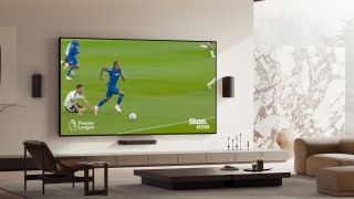 Sony True RGB TV mounted on a wall, displaying sports content.