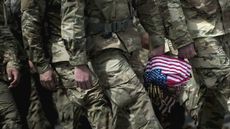 wd-us_troops_flag_-_brendan_smialowskiafpgetty_images.jpg