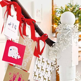 Christmas card display on staircase