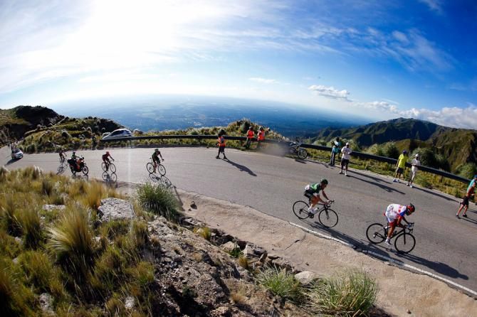 The sun beats down on riders climbing in San Luis.