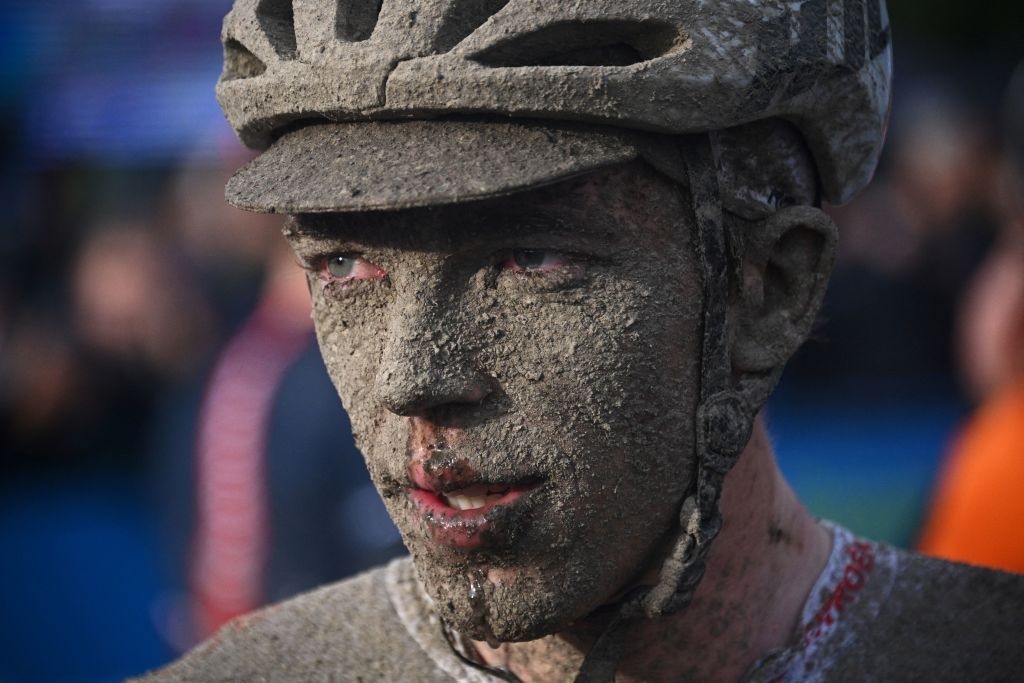 AG2R Citroen Team Stan Dewulf from Belgium reacts on the finishing area after competing in the 118th edition of the ParisRoubaix oneday classic cycling race between Compiegne and Roubaix in the Velodrome stadium in Roubaix northern France on October 3 2021 Photo by AnneChristine POUJOULAT POOL AFP Photo by ANNECHRISTINE POUJOULATPOOLAFP via Getty Images