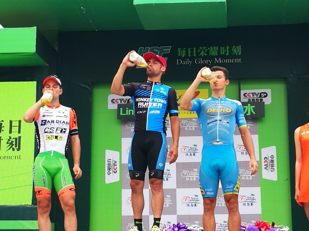 Thirsty work. Marco Maronese, stage winner Marco Zanotti and Emils Liepins after stage 8 of the Tour of Hainan.