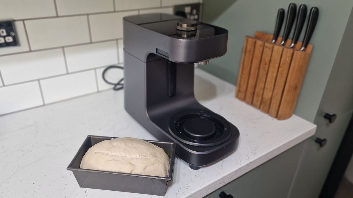 The Ooni Halo Pro Spiral mixer being tested in a green and white kitchen