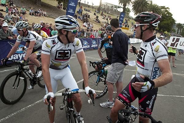 How close was that bro: Brothers Wes (left) and Bernard Sulzberger discuss the finish as Matt Keenan interviews Greg Henderson (behind). The three were involved in the winning break along with Baden Cooke before Cooke struck mechanical trouble.