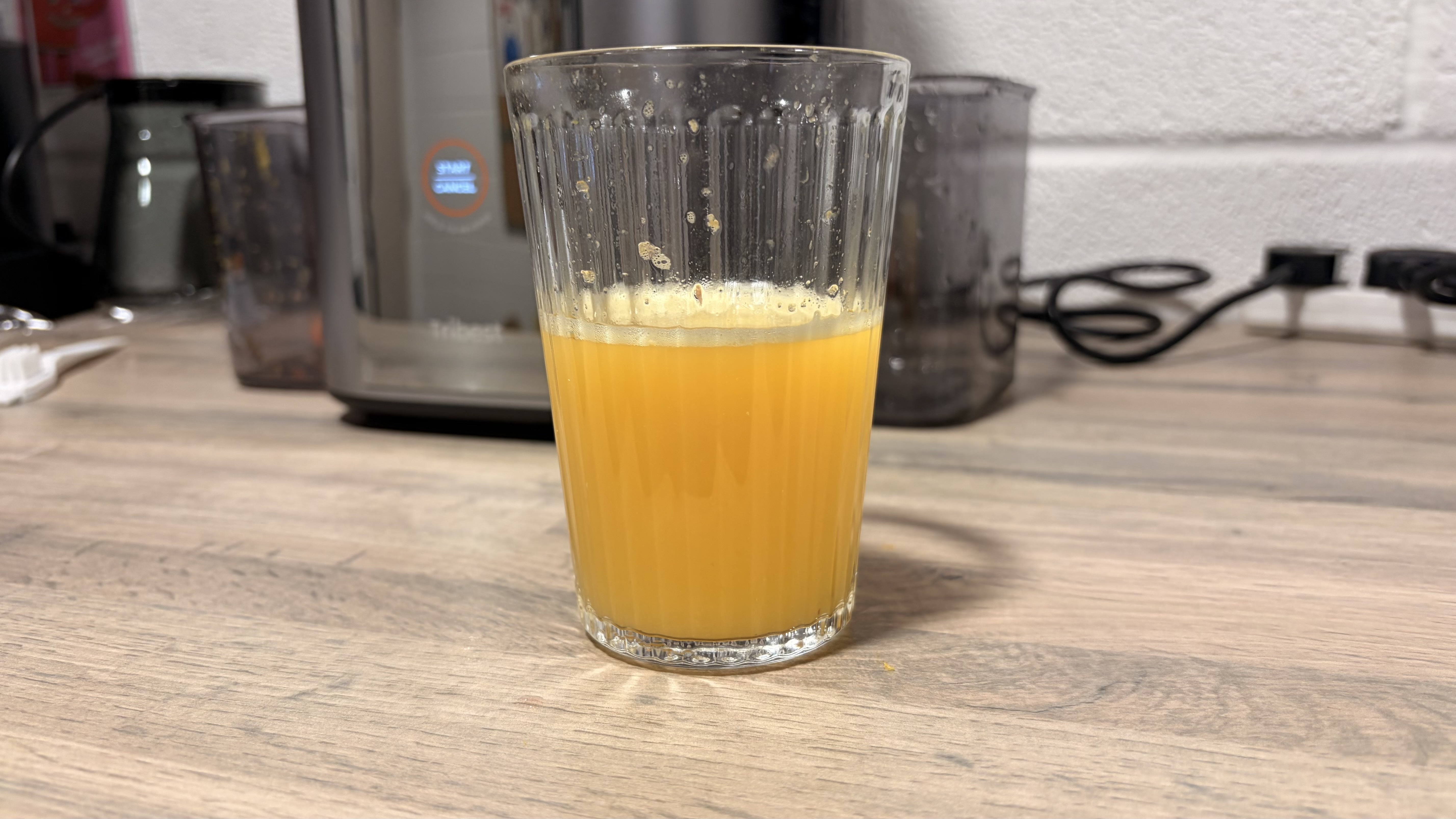 Apple juice made using the Tribest Slowstar AI Vertical Hopper Juicer