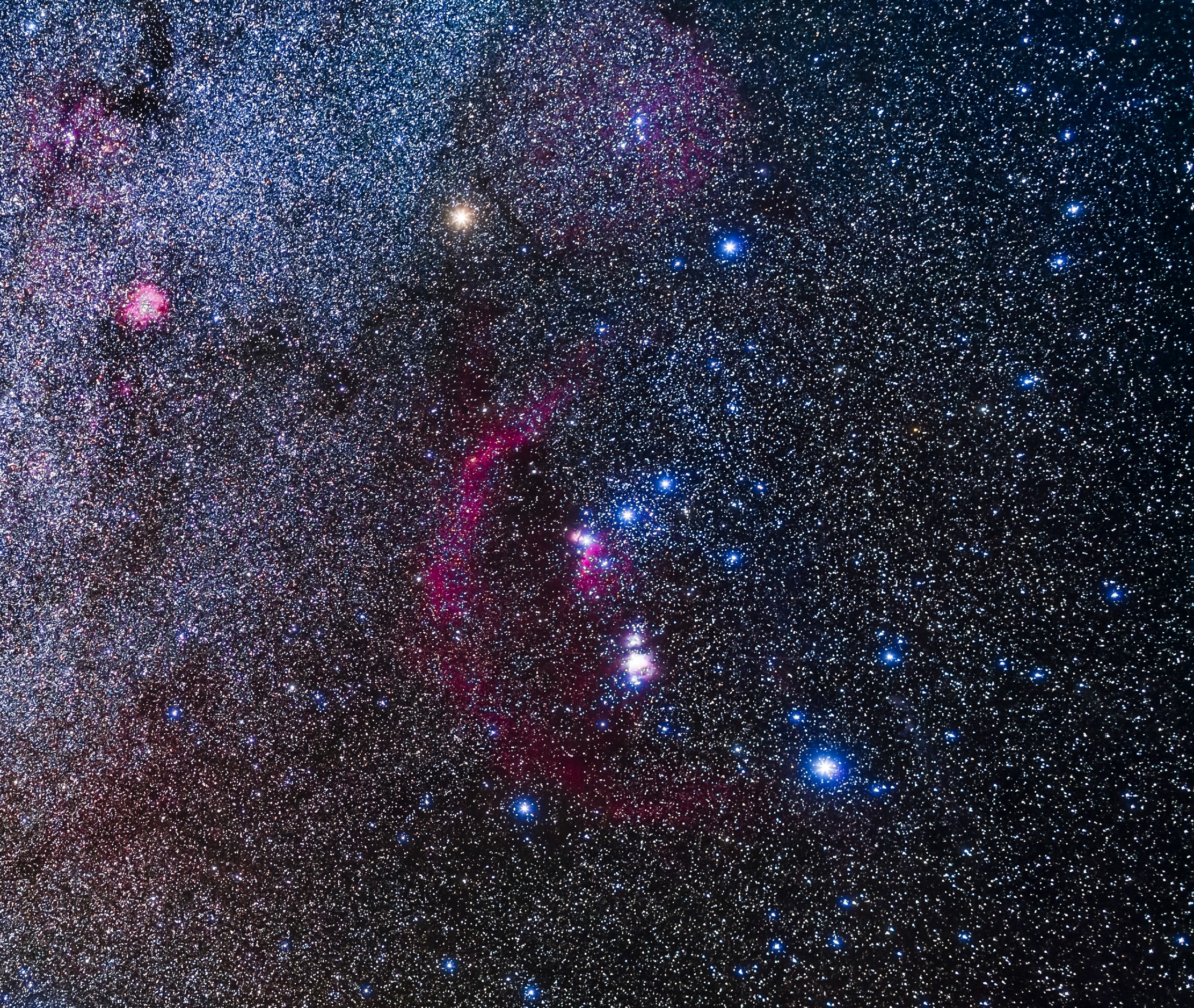 A picture of the Orion constellation and nebula in a starry sky