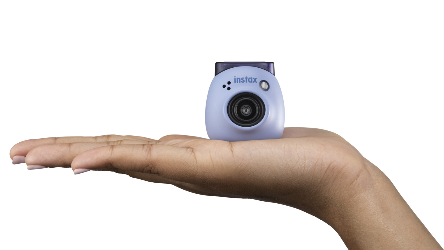 Blue Fujifilm Instax Pal in the palm of a hand on a white background