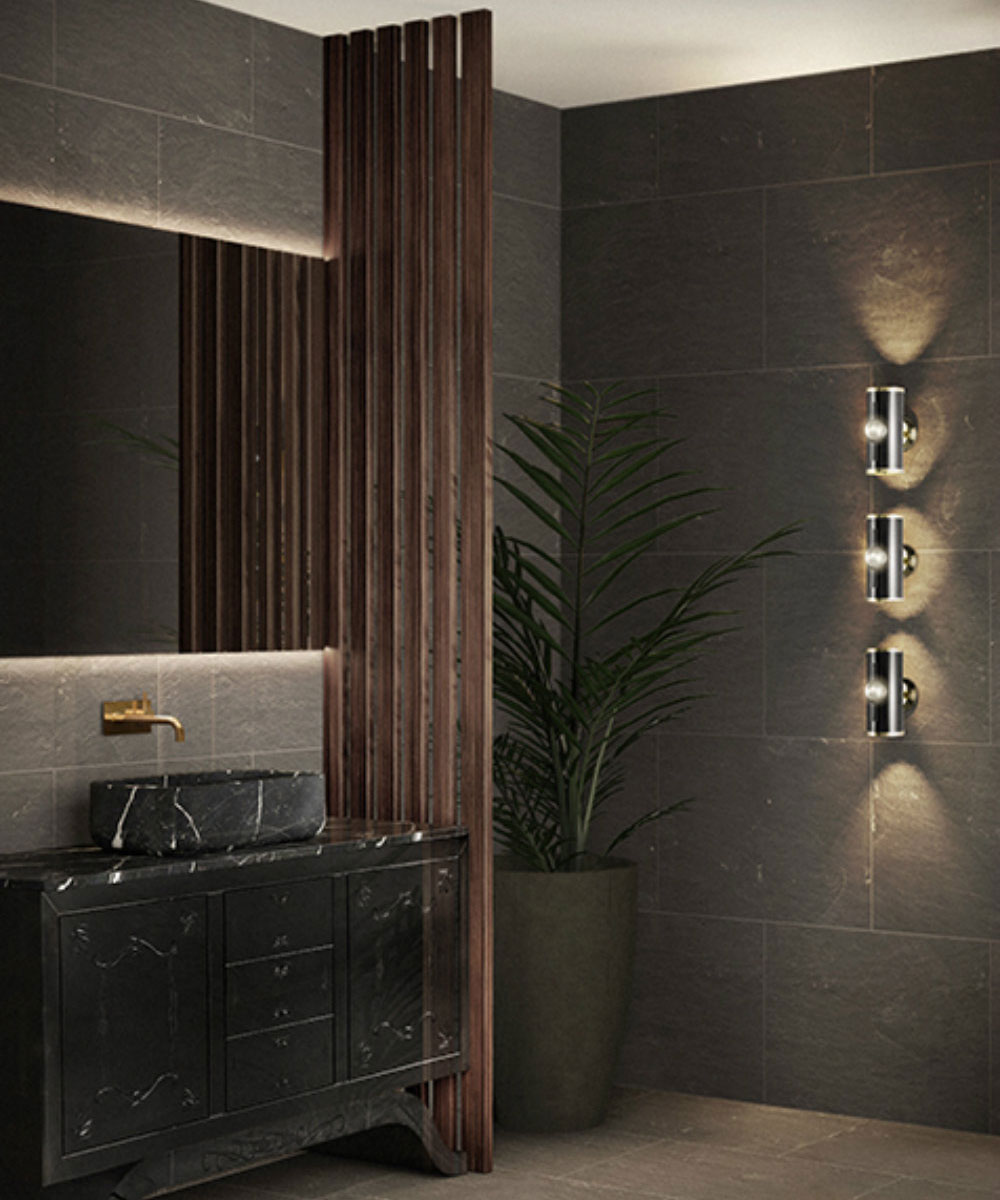 small bathroom with slate walls and modern lighting with slatted wooden room divide