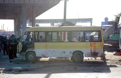 The bus targeted by a suicide bomber Monday in Kabul.