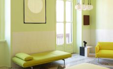 a living space with bright yellow interiors