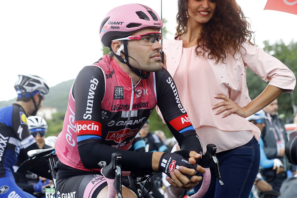 Dutch cyclist Tom Dumoulin of team Giant - Alpecin looks on as he bears the leader's pink jersey before the start of the 6th stage of 99th Giro d'Italia