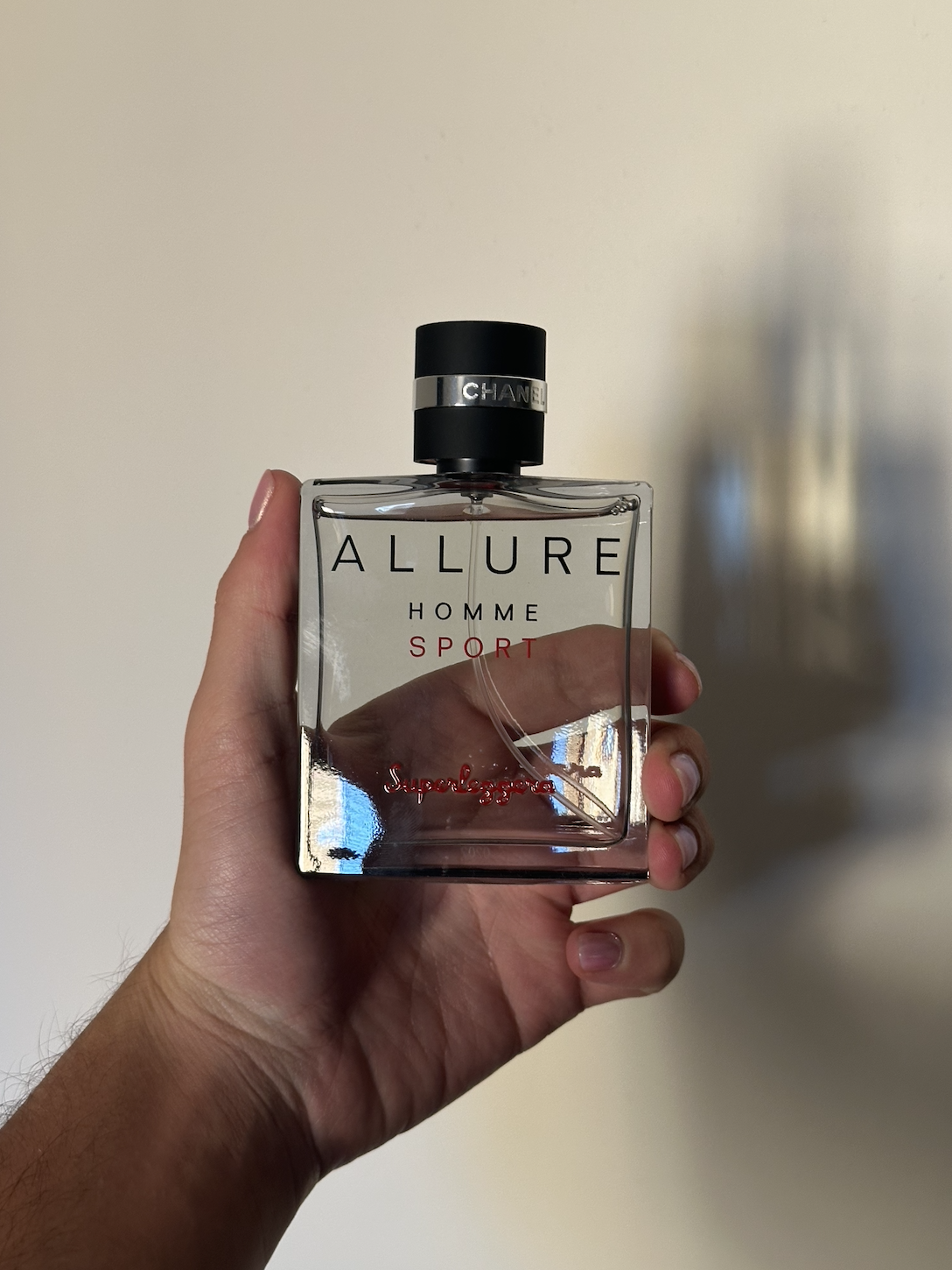 David Evan Ruff holding Chanel Allure Homme Sport