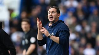 Chelsea interim manager Frank Lampard gives the team instructions during the Premier League match between Chelsea and Brighton & Hove Albion at Stamford Bridge on April 15, 2023 in London, United Kingdom.
