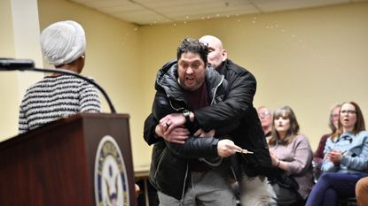 Assailant tackled after spraying unknown liquid at Rep. Ilhan Omar (D-Minn.)