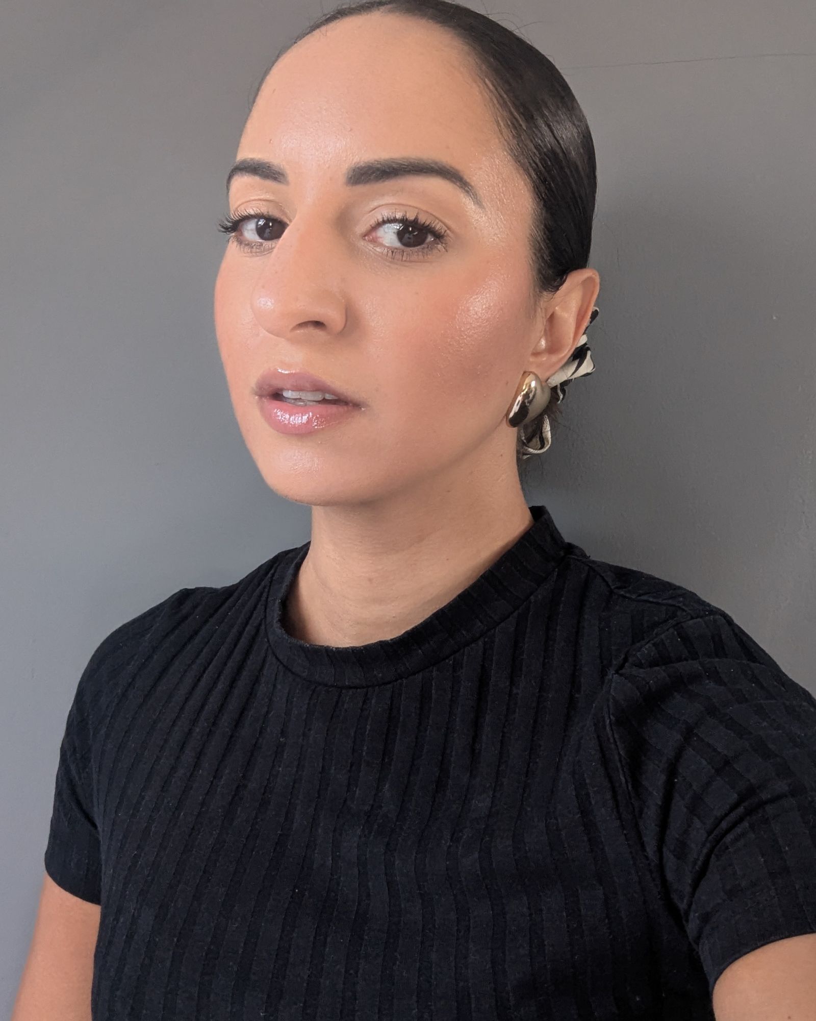 Jazzria Harris wearing Rimmel Kind & Free Blur It Out Mattifying Skin Tint, one of the best blurring foundations