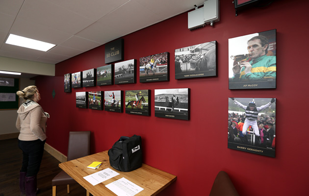 Pictures of members of the 50 club in the weighing room at Cheltenham Racecourse &mdash; these are photos of those jockeys who have achieved 50 winners at Cheltenham