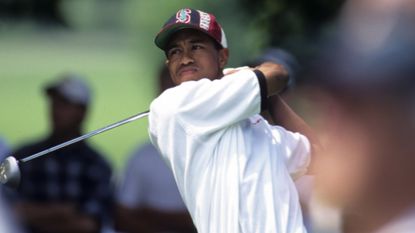 Tiger Woods takes a shot while representing Stanford