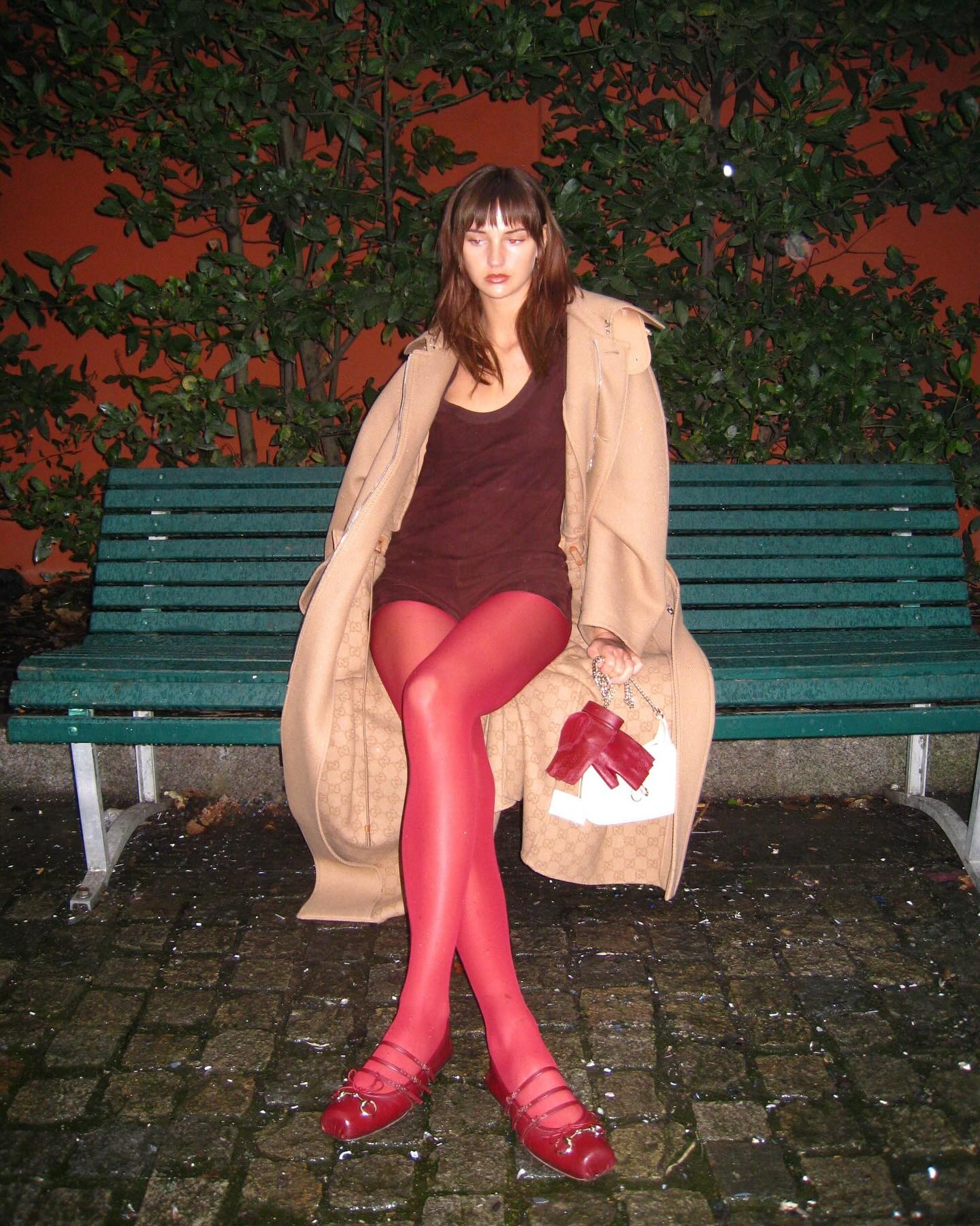 Fashion person Mia Regan wears one of this winters shoe colour trends. She wears red shoes with red tights in a recent image take from her Instagram