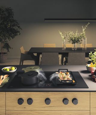 Novy Easy 90 Prestige 90cm Vented Induction Hob With Rotary Dial Controls in black worktop with wooden island base